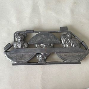 Vintage chocolate, candy, mold. Heavy metal.